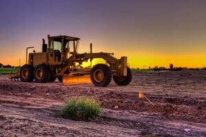 grader doing civil works on a property